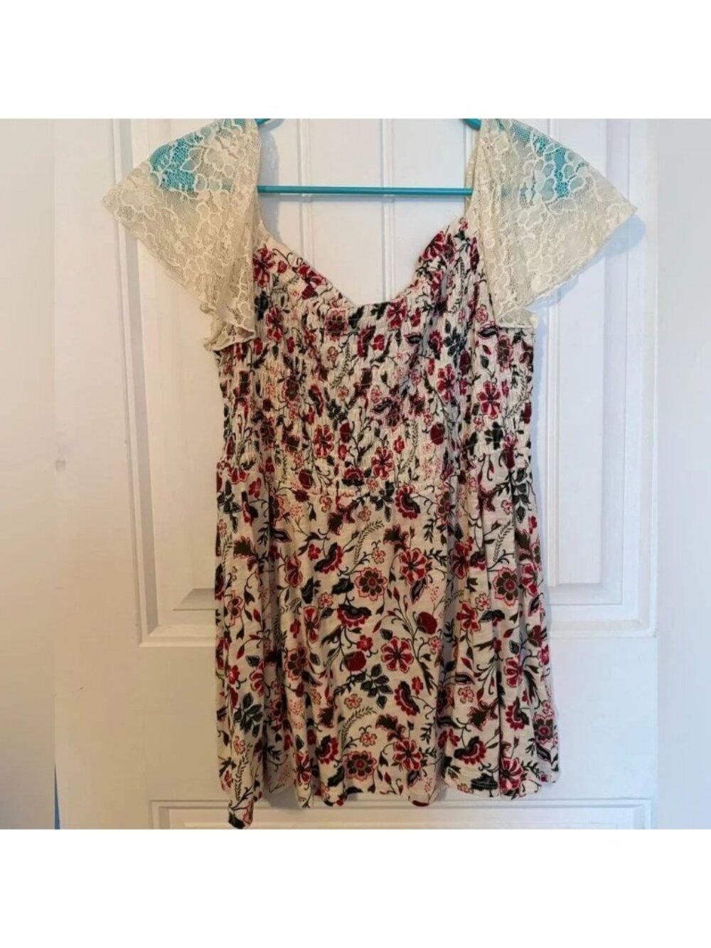Torrid Floral Smocked Neck Top - size 00